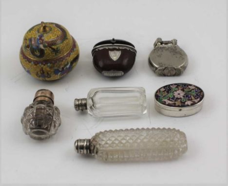 AN EARLY 19TH CENTURY VESTA FORMED FROM A NUT, with white metal fittings, to include a bull's head crest, engraved on a shiel