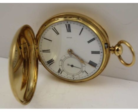 AN 18CT GOLD HUNTER TYPE GENTLEMAN'S POCKET WATCH white enamel dial with Roman numerals and secondary dial, the movement engr