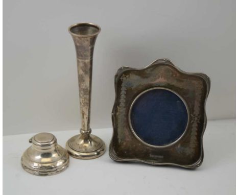 THOMAS BISHTON A SILVER MOUNTED EASEL PHOTOGRAPH FRAME, the shaped mount with engraved swag decoration, Birmingham 1915, to s