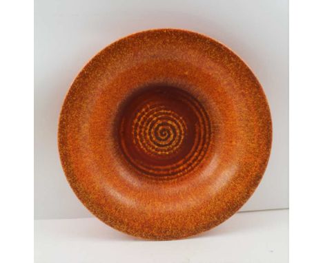 "A ROYAL LANCASTRIAN" STUDIO POTTERY SHALLOW POTTERY BOWL, moulded swirl to base in flecked orange glaze, factory marks to ba