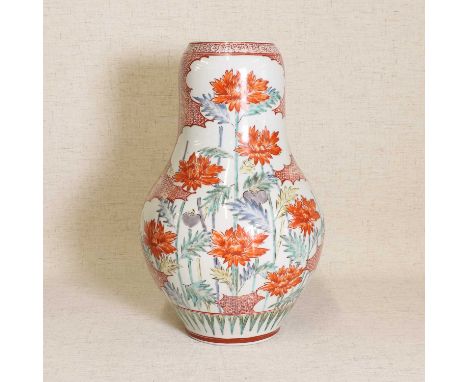 A Japanese Ko-Kutani style vase,Edo period (1615-1868), of baluster form, painted with chrysanthemum in shaped panels against