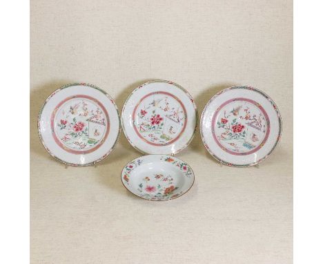 A collection of three Chinese famille rose plates, 18th century, the rounded sides rising from a circular foot, painted with 