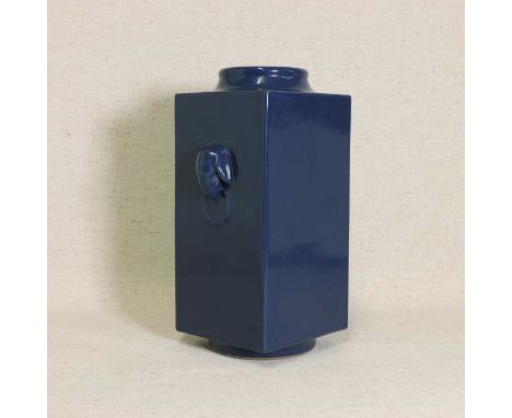 A Chinese blue-glazed cong vase,Guangxu (1875-1908), of archaic jade form, the square body rising from a short foot to a narr