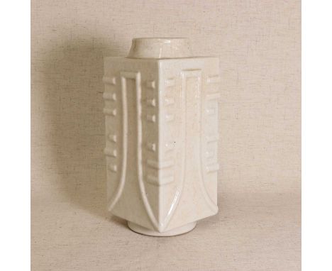 A Chinese cong vase, Republic period (1912-1949), heavily potted after the archaic jade form, the square body rising from a s