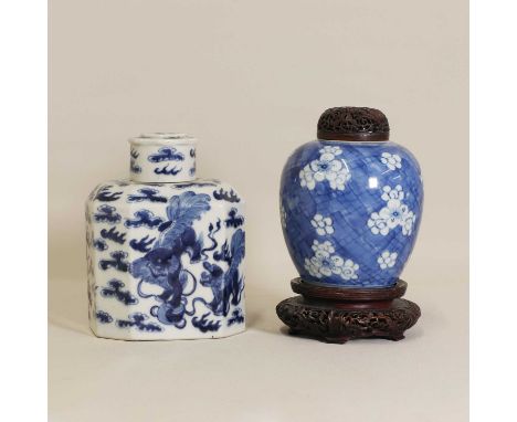 A Chinese blue and white tea caddy and cover, late Qing dynasty, of octagonal form, painted with a Buddhist lion playing with