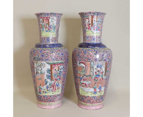 A pair of Chinese export Canton painted enamel vases,19th century, each ovoid body rising from an everted foot to a flared mo