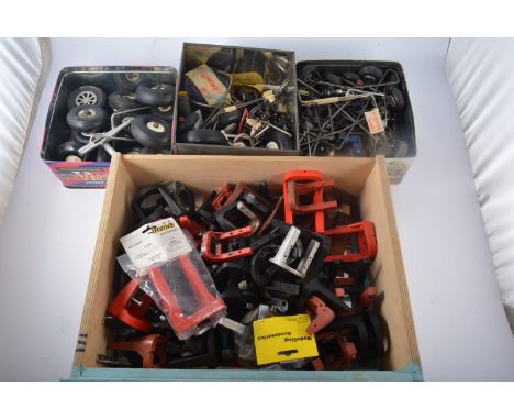 Drawer containing ENGINE MOUNTS and 3 TINS containing WHEELS, STRUTS, ETC.