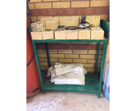 Welding bench with fire bricks.