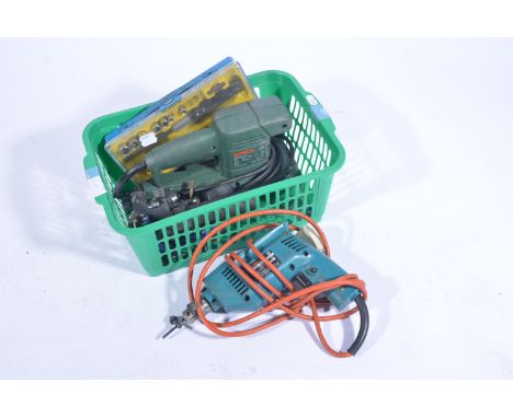 Green crate containing Electric Drill, Sander, Screwdriver kit and Clamps etc.