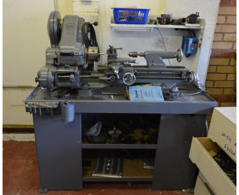Myford Super 7 lathe, with work bench base/cabinet, multiple accessories.This lot to be viewed on site by appointment - 01858