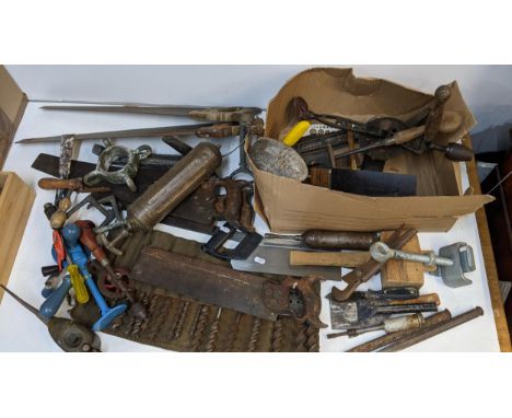 Vintage tools to include saws, an oil can, drill bits, drills and other items Location:If there is no condition report shown,