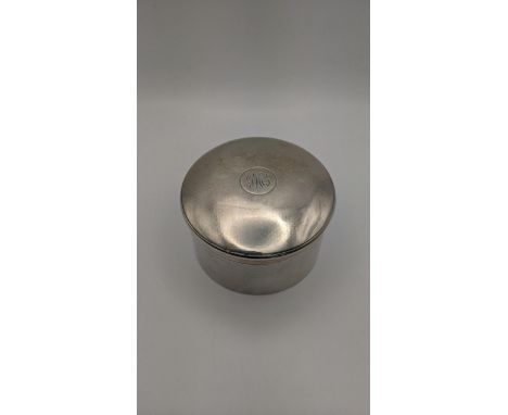 A D and J Wellby Ltd dressing table pot having an engine turned design and a gilt interior hallmarked London 1934, 188.9g Loc