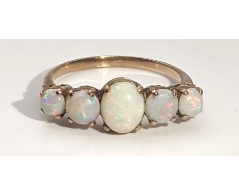 A gold and 5 stone opal ring tested as 9ct gold 2gLocation:If there is no condition report shown, please request 