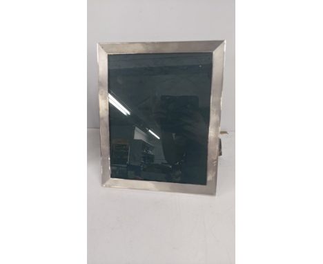 A silver engine turned photo frame hallmarked Birmingham 1967 28.5cm x 23.5cm Location:If there is no condition report shown,