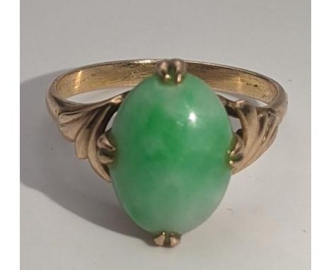 A gold and jade ring tested as 14ct gold, size N, 3.3g Location:If there is no condition report shown, please request 