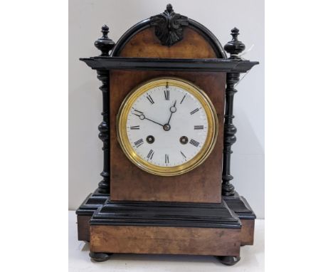 A 19th century French 8 day walnut and ebonised mantle clock, striking on a single bell 28hLocation:If there is no condition 