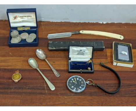 A mixed lot of collectables to include a cut throat razor, a Zippo lighter, hat pins, some miscellaneous coins and other item