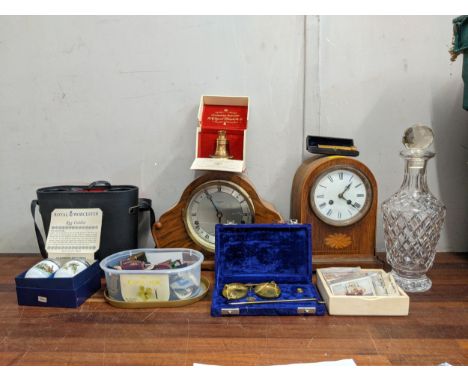 A mixed lot to include two early 20th century mantle clocks, some postage scales, some cloth badges a pair of Admiral Boats I