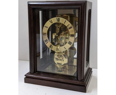 A mid 20th century Hamilton mantle clock in a mahogany case 22hLocation:If there is no condition report shown, please request