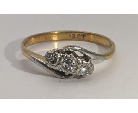 An 18ct gold ring set with three illusion set diamonds Size R, 3.2gLocation:If there is no condition report shown, please req