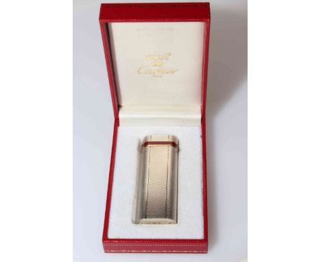 Cartier Paris engine-turned gas cigarette lighter, in original case with outer box, certificate and booklets.