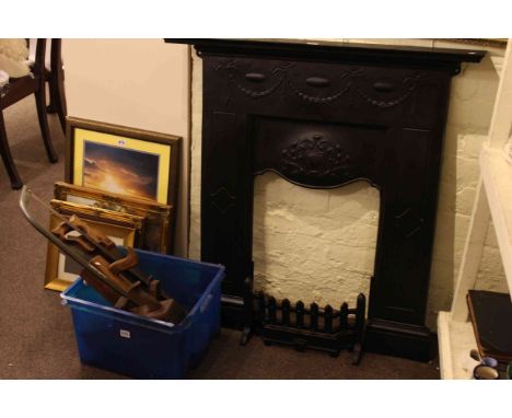 Cast iron fireplace and collection of hand tools including planes.