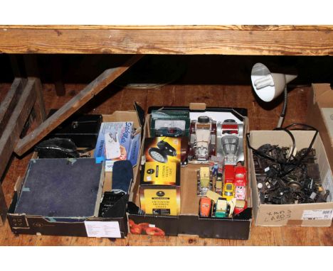 Three boxes of pencil sharpeners, Diecast toys, camera, roulette, etc.