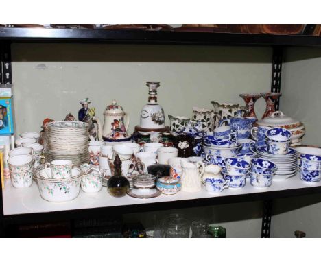 Shelf of ceramics including tureen, commemorative, teapots and framed prints, etc.
