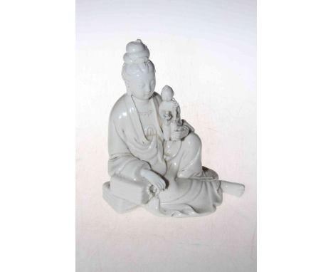 Antique Chinese Blanc de Chine Guanyin figure, double seal mark to back, 20cm.