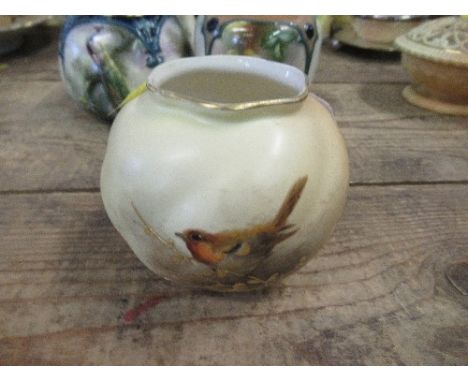 A Royal Worcester vase, shape G161, decorated with a Robin, height 3ins