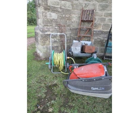 A collection of tools, ladder, wheel barrow etc&nbsp;