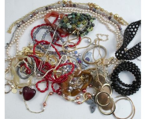 A collection of assorted costume jewellery and some ladies wrist watches