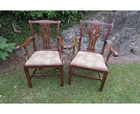 A pair of Chippendale style 19th century mahogany armchairs, with makers label Spillman and Co. London
