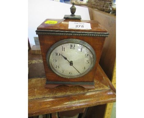 A mantle clock, together with an Art Deco style clock