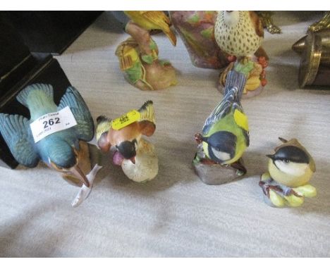 Four Royal Worcester birds