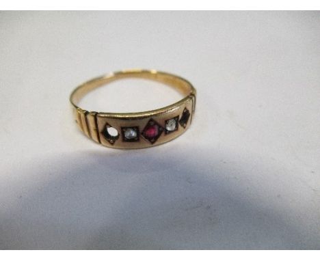 A 15 carat gold ring, some settings vacant, 1.6g gross