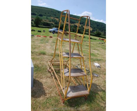 A moveable 4 ' step ladder.