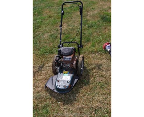 A Hayter "Power Trim" push-along strimmer, no attachments, engine turns.