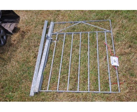 A galvanised garden gate with hanging post, 80" wide x 391/2" tall.