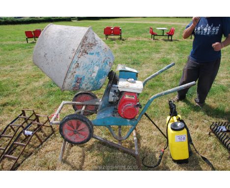 A cement mixer with a Honda engine on a stand [runs, good compression]