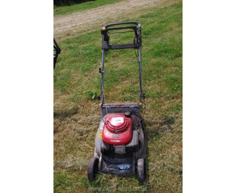 A Honda HRB475 petrol engined lawn mower with rear roller, no grass collector, good compression. 