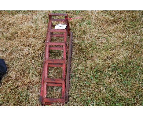 A pair of light weight car ramps.