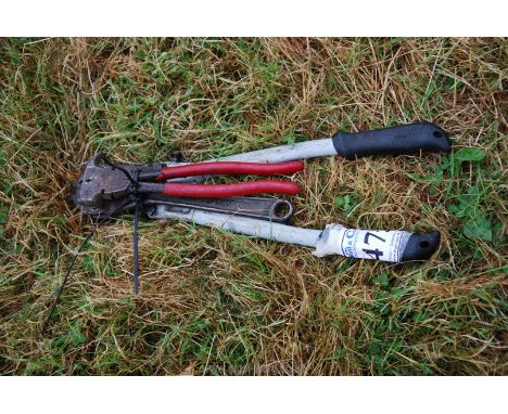 Bolt cutter, fencing pliers and an adjustable spanner.