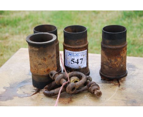 D-shackles and four engine cylinder liners/sleeves.