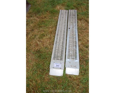 A pair of light-weight Loading Ramps 6 ft x 9" approx.