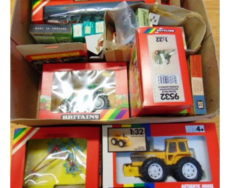A BRITAINS FARM COLLECTION comprising No.9526, Deutz DX92 Tractor; No.9521, County 1884 Tractor; No.9532, Vermeer Round Baler