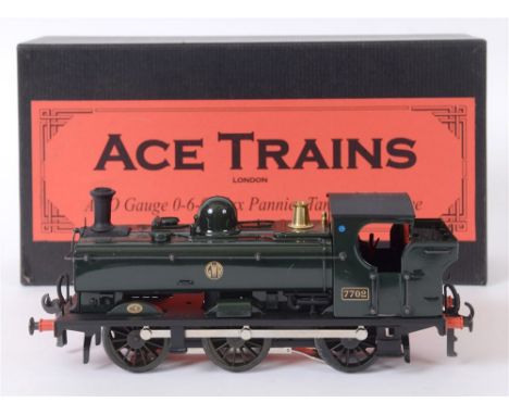 [O GAUGE]. AN ACE TRAINS G.W.R. CLASS 57XX 0-6-0 PANNIER TANK LOCOMOTIVE, 7702 green livery with 'shirt button' roundel, boxe