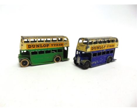 TWO PRE-WAR DINKY NO.29C, DOUBLE DECKER BUSES each with A.E.C. grille, cutaway wings and cast-in stairs, the first cream over