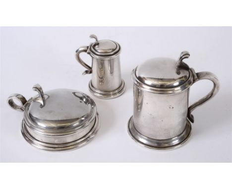 A DUNHILL BRITANNIA METAL DESK SET comprising a lighter, in the form of a tankard, 8.5cm high inclusive of thumb-piece; a cig