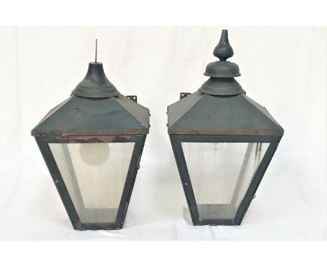 PAIR OF VICTORIAN STYLE EXTERNAL WALL LAMPSwith steel bodies, one with a finial above four glass panel sides of tapering form